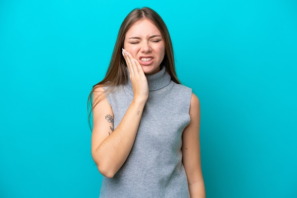 Young,Lithuanian,Woman,Isolated,On,Blue,Background,With,Toothache